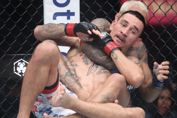 UFC 326 turnirining natijalari, Oliveyra Xolloueyni mag'lub etib, BMFNING yangi chempioni bo'ldi